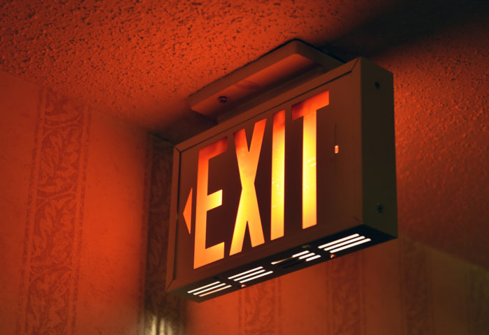 Illuminated emergency exit sign